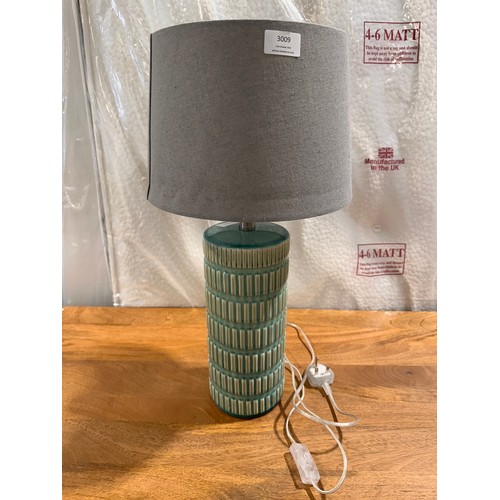 3128 - A green table lamp with grey shade