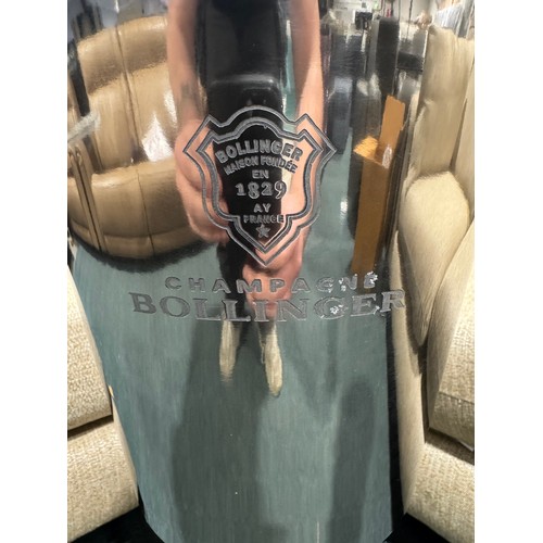 3165 - A silver effect floor standing champagne holder