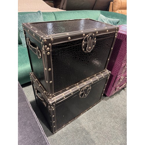 3166 - A pair of black faux crocodile skin storage trunks