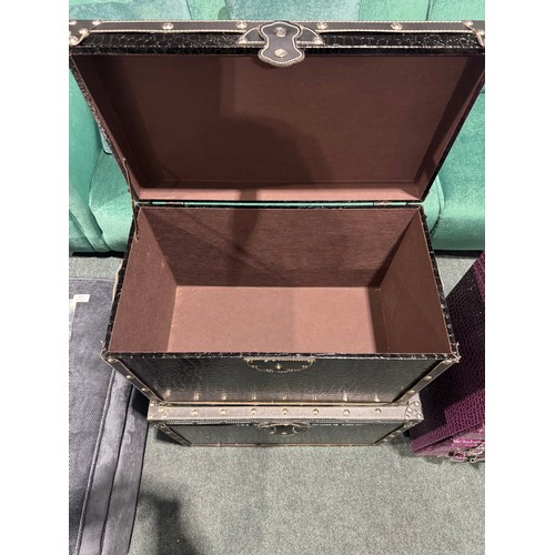 3166 - A pair of black faux crocodile skin storage trunks