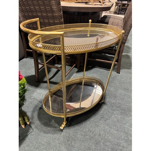 3229 - A gold effect mirrored drinks trolley