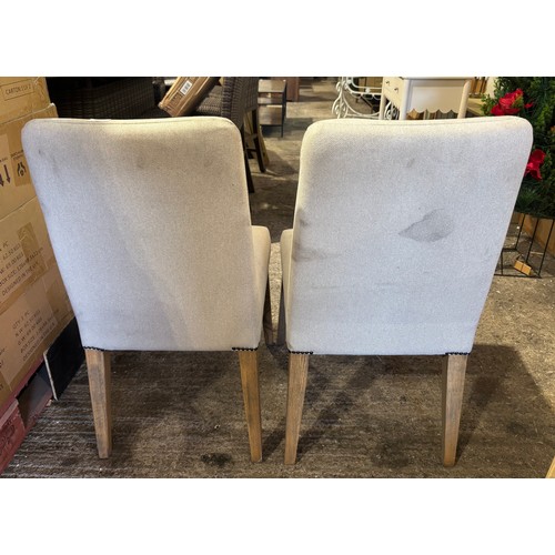 3140 - A Pair of campo calico rex dining chairs (Marked fabric)