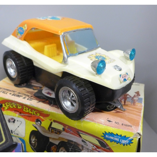 2059 - Three battery operated model cars, John Player Special, a Japan made Highway Patrol Car and Speed Bu... 