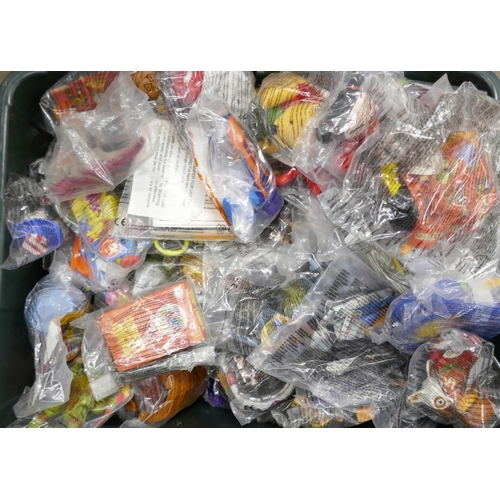 2284 - A large collection of McDonald's Happy Meal Toys, to include Snoopy, Minnie Mouse, Disney examples, ... 