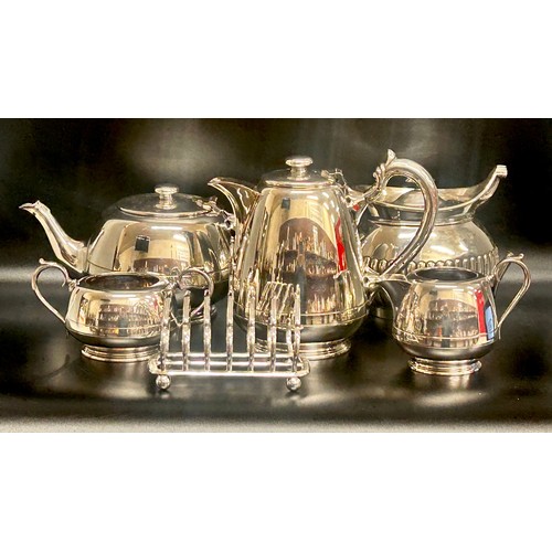 2262 - Collection of silver plate to include Walker & Hall, Sheffield four piece tea service, toast rack an... 