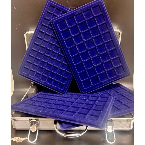 2268 - An aluminium case with collectors coin trays