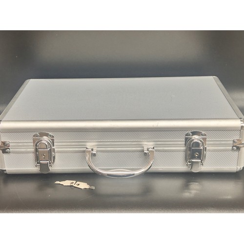 2268 - An aluminium case with collectors coin trays