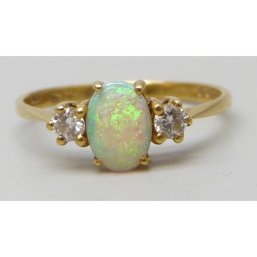 7123 - An 18ct gold, opal and diamond ring, 1.9g, L