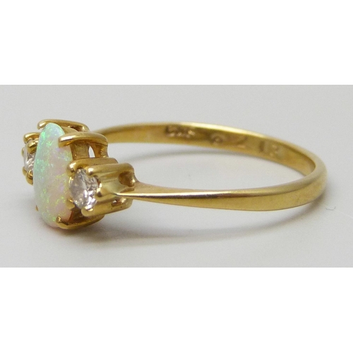 7123 - An 18ct gold, opal and diamond ring, 1.9g, L