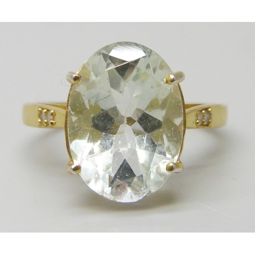 7138 - A silver gilt ring set with a pale green stone, N/O