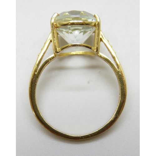 7138 - A silver gilt ring set with a pale green stone, N/O