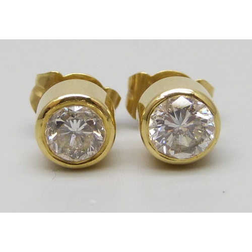 7139 - A pair of 18ct gold and diamond stud earrings, approximately 0.8ct total diamond weight