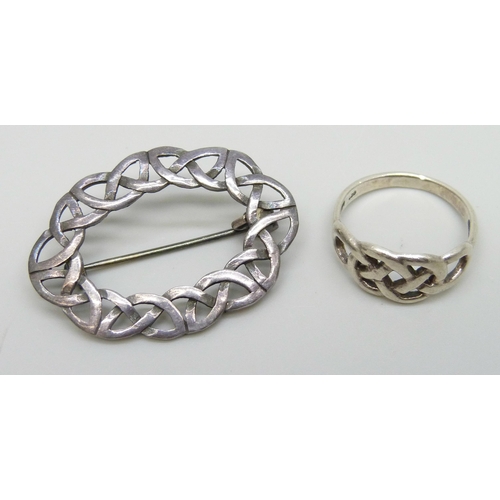 7143 - Celtic knot design jewellery - a white metal brooch, 3.7cm, and a silver ring, O/P