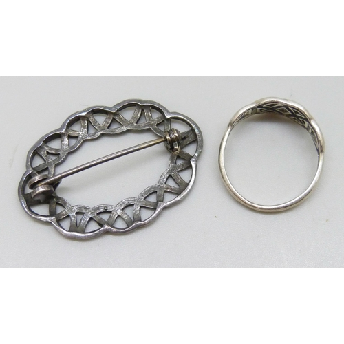 7143 - Celtic knot design jewellery - a white metal brooch, 3.7cm, and a silver ring, O/P