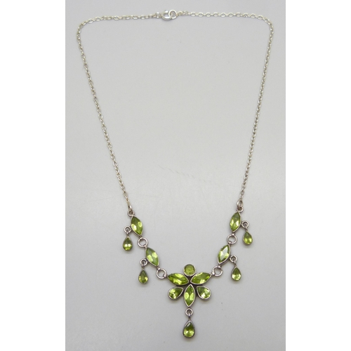7149 - A silver and peridot gemstone drop necklace, 43cm