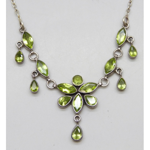 7149 - A silver and peridot gemstone drop necklace, 43cm