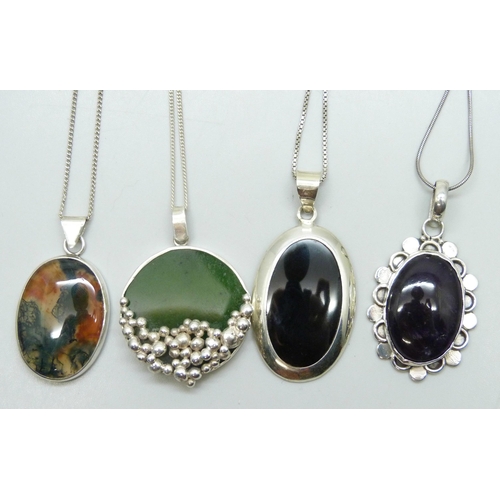 7156 - Four silver stone set pendants and chains including a nephrite example and moss agate, 52g