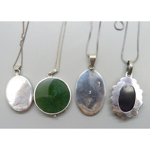 7156 - Four silver stone set pendants and chains including a nephrite example and moss agate, 52g