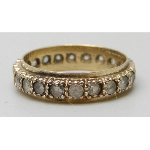7173 - A 9ct gold spinel set eternity ring, 2.2g, L