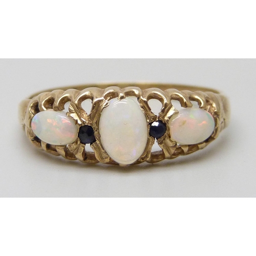 7175 - A 9ct gold, opal and sapphire ring, 1.3g, R