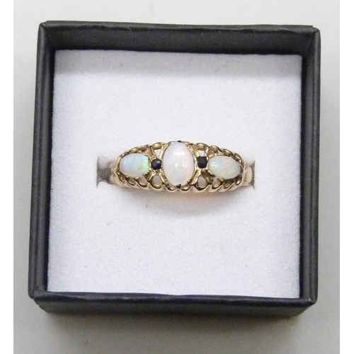 7175 - A 9ct gold, opal and sapphire ring, 1.3g, R