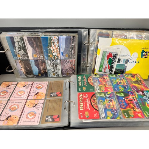 2295 - A large collection of telephone cards in albums  *Not available for packing and posting*