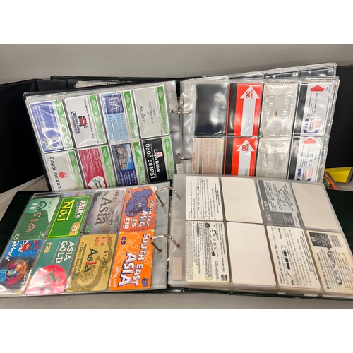 2295 - A large collection of telephone cards in albums  *Not available for packing and posting*