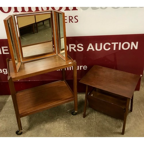 61 - A teak trolley, magazine rack and a dressing mirror