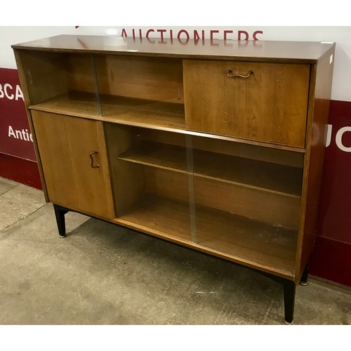 58 - A Nathan tola wood and black bookcase