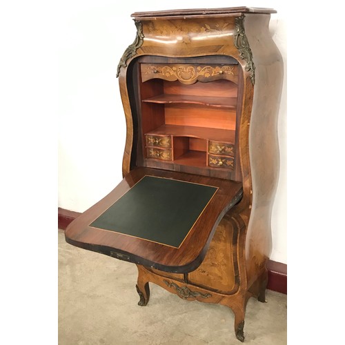 77 - A French Art Nouveau style marquetry inlaid walnut, rosewood, rouge marble topped and ormolu mounted... 
