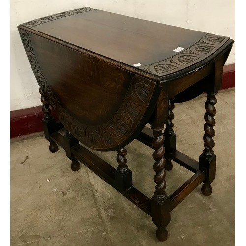 101 - An early 20th Century oak barleytwist gateleg table