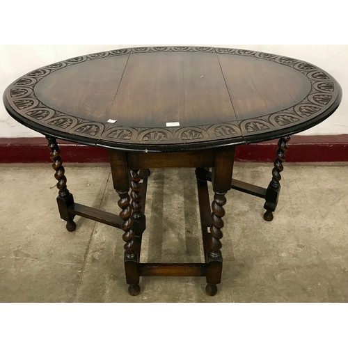 101 - An early 20th Century oak barleytwist gateleg table