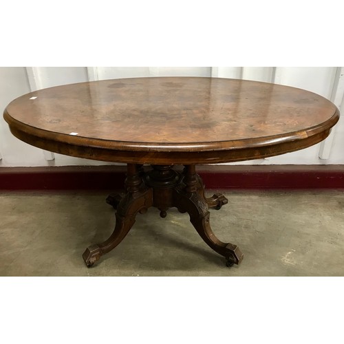 85 - A Victorian inlaid figured walnut oval loo table