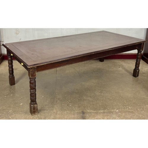 98 - A large early 20th Century elm and leather topped two drawer library table