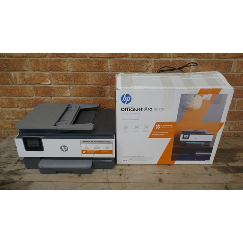 A boxed HP Office Jet Pro 8022E all in one printer and one other HP ...
