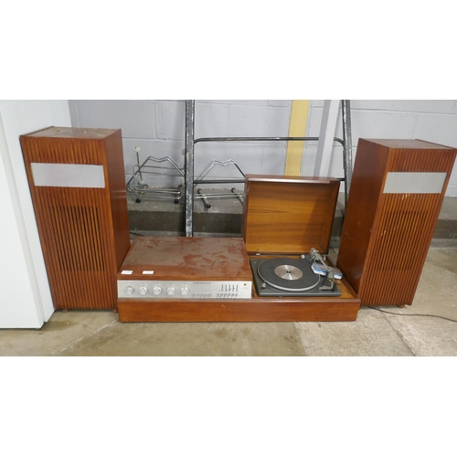 A Ferguson stereo transmission music centre with turntable record ...