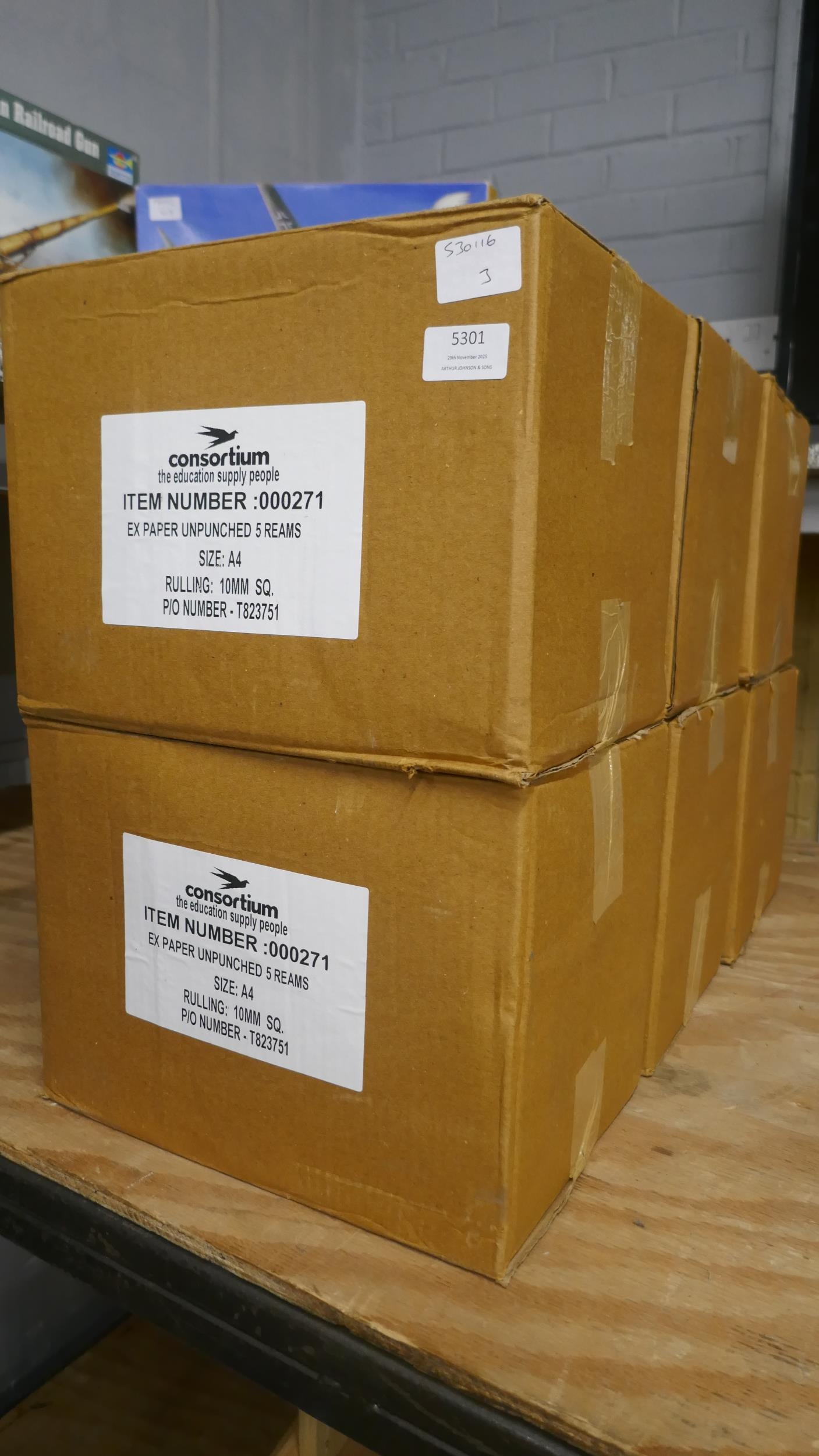 6 boxes of Consortium un-punched 10mm square lined paper - 5 reams per box
