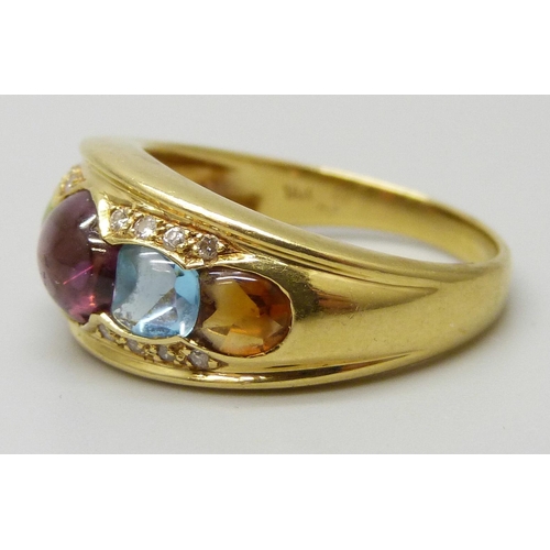 7031 - An 18ct gold multi gemstone set ring, 5.7g, P