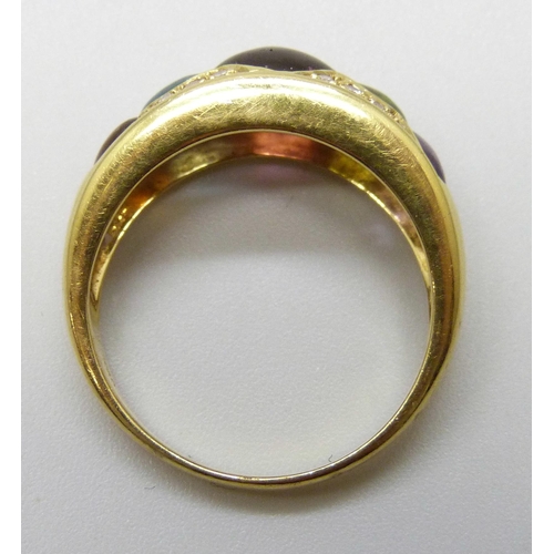 7031 - An 18ct gold multi gemstone set ring, 5.7g, P
