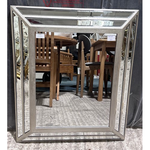 3239 - A cushioned bevelled edge wall hanging mirror