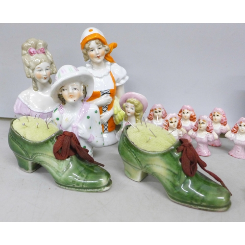 2143 - Two china brooches with a matching pair of earrings, two shoe pin cushions, a china posy, four large... 