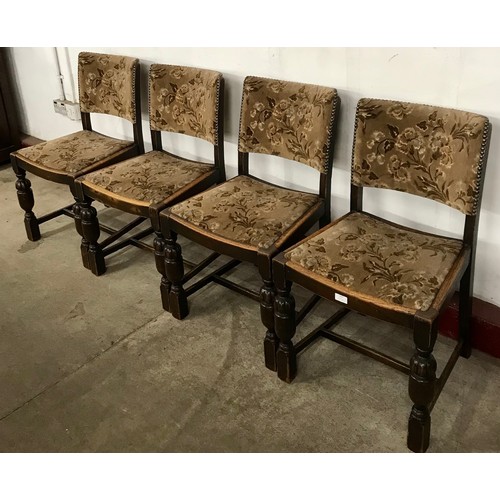 183 - A set of four early 20th Century oak dining chairs