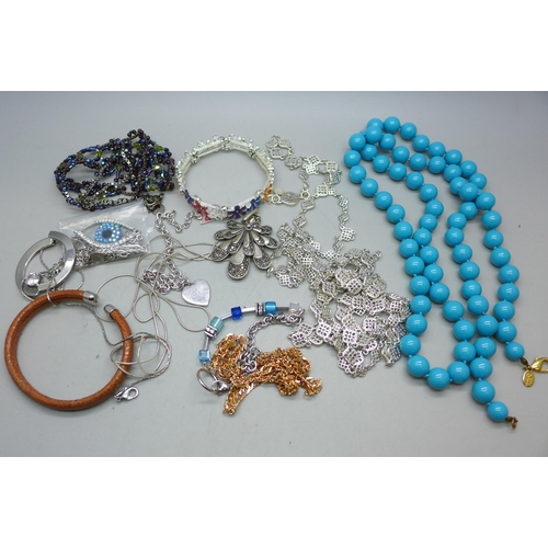 7301 - A collection of costume jewellery including Butler & Wilson, Joan Rivers and Coeur De Lion