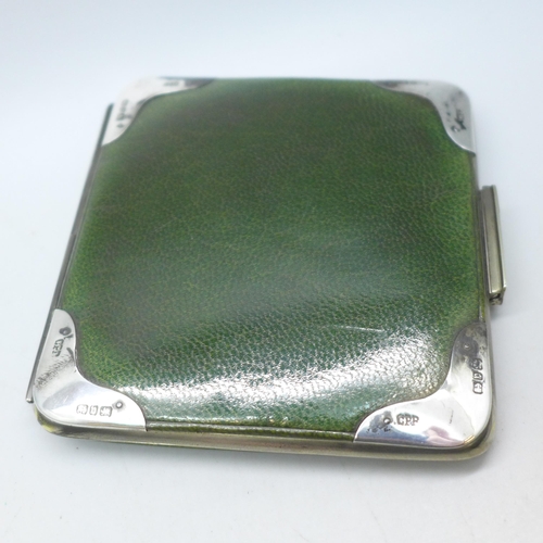 7384 - A Victorian silver mounted leather wallet, Birmingham, 1895, 9.5 x 9.2cm, initials to interior