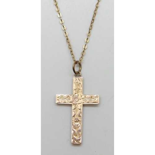 7119 - A 9ct gold cross pendant, on a 9ct gold chain, 1.9g total, pendant 3.2cm including bail