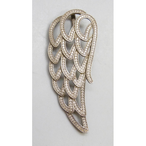 7137 - A Pandora silver angel wing design pendant set with white stones, 5cm