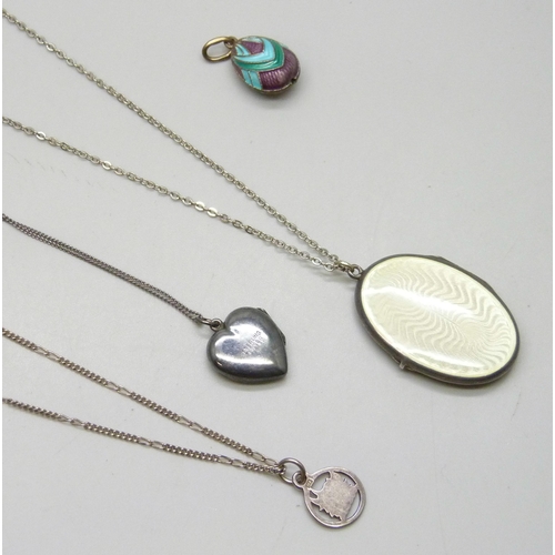 7164 - A white metal and guilloche enamel locket pendant with floral decoration, 3.7cm, a Russian enamelled... 