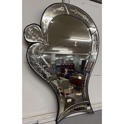3286 - A bevelled edge wall hanging mirror