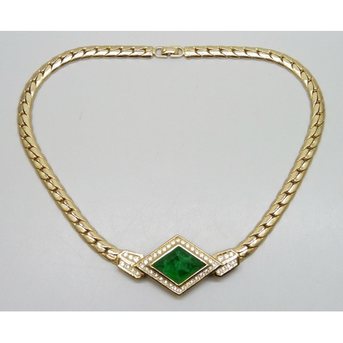 7195 - A vintage Christian Dior gold tone green and white stone necklace, 39cm