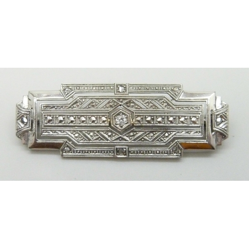 7215 - A white metal Art Deco diamond brooch, 4.9g, 4.3cm, boxed